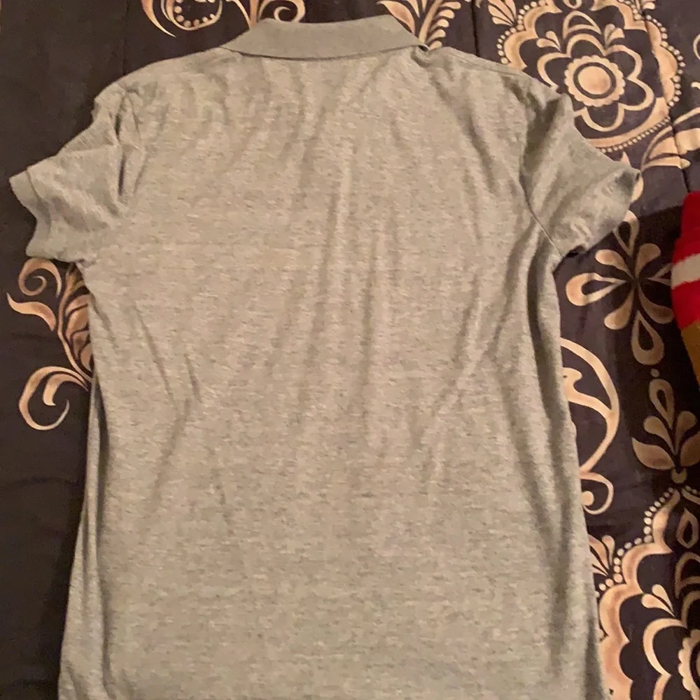 Lightly used, gray American Eagle polo. Size: slim fit Medium - Picture 2 of 3